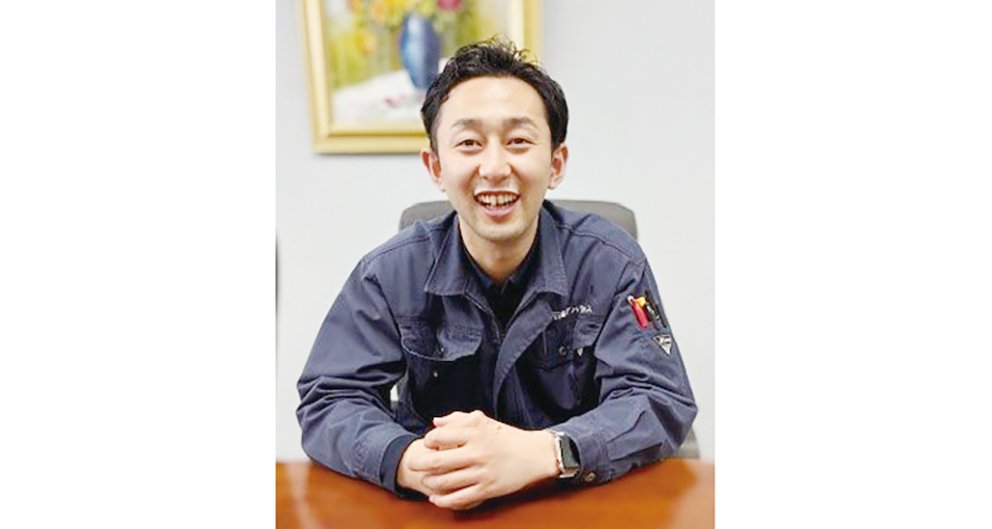 扉の先菅原専務.jpg