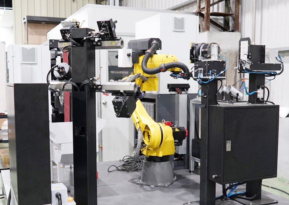 9面ロボットSIer特集・TECHNO REACHP2.jpg